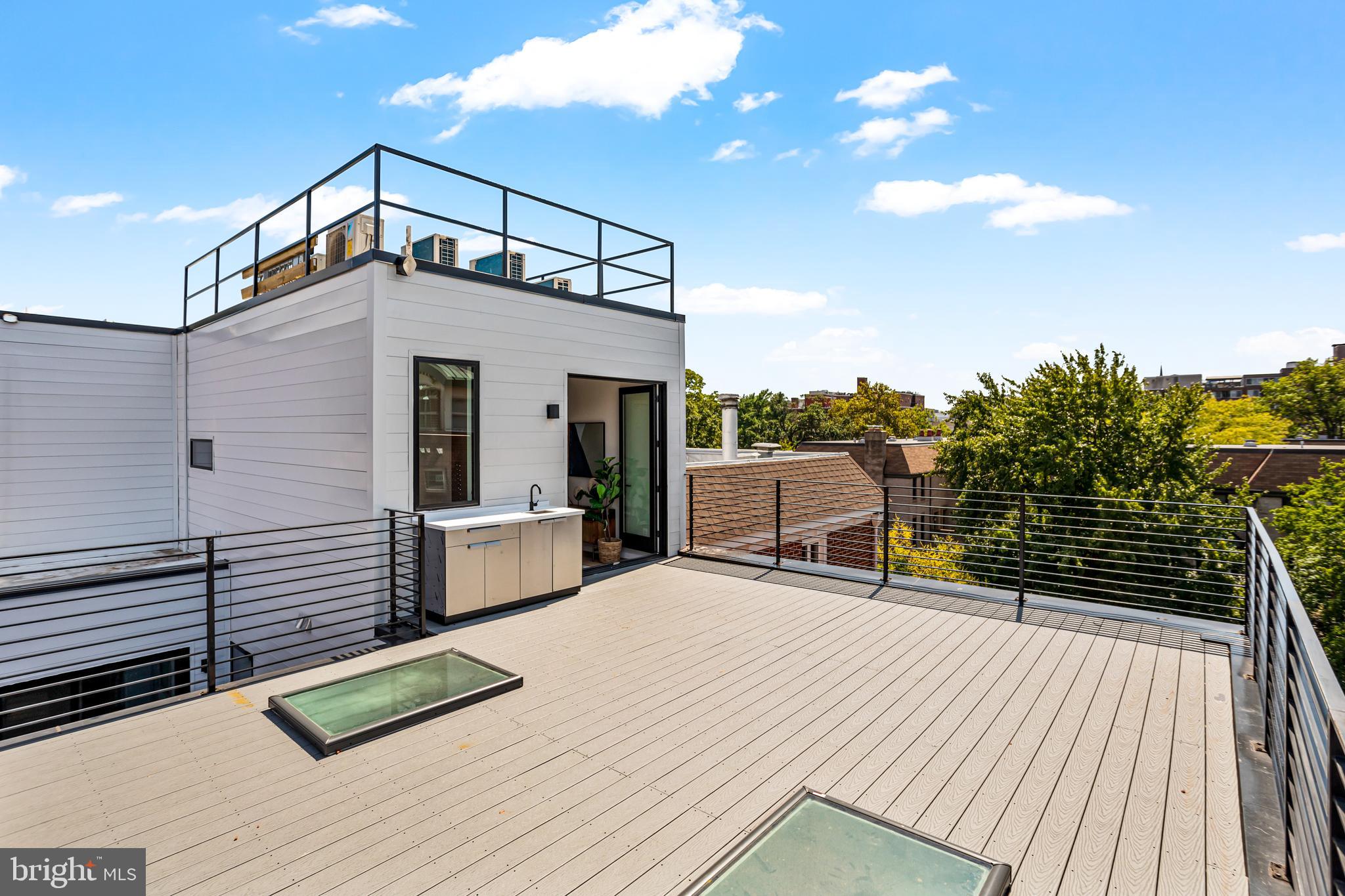 1402 12th Street Northwest, Unit 10 Washington, DC 20005 - Photo 2 of 38 a view of a roof deck