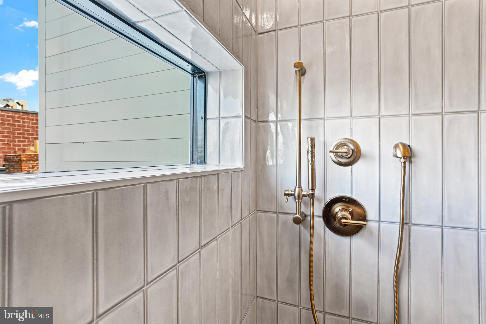 1402 12th Street Northwest, Unit 10 Washington, DC 20005 - Photo 33 of 38 a bathroom with a shower