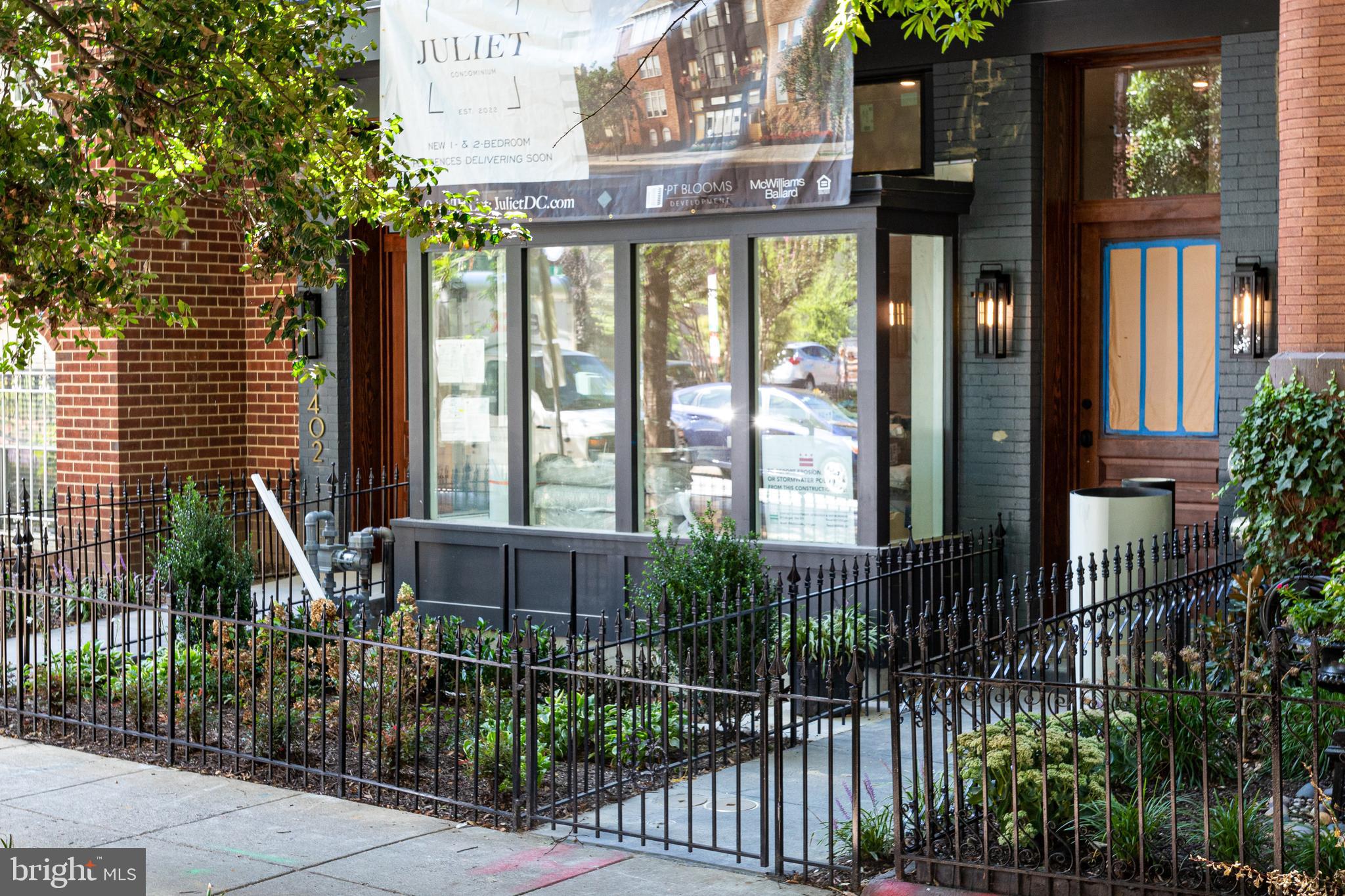 1402 12th Street Northwest, Unit 10 Washington, DC 20005 - Photo 4 of 38 a front view of a house having outdoor seating