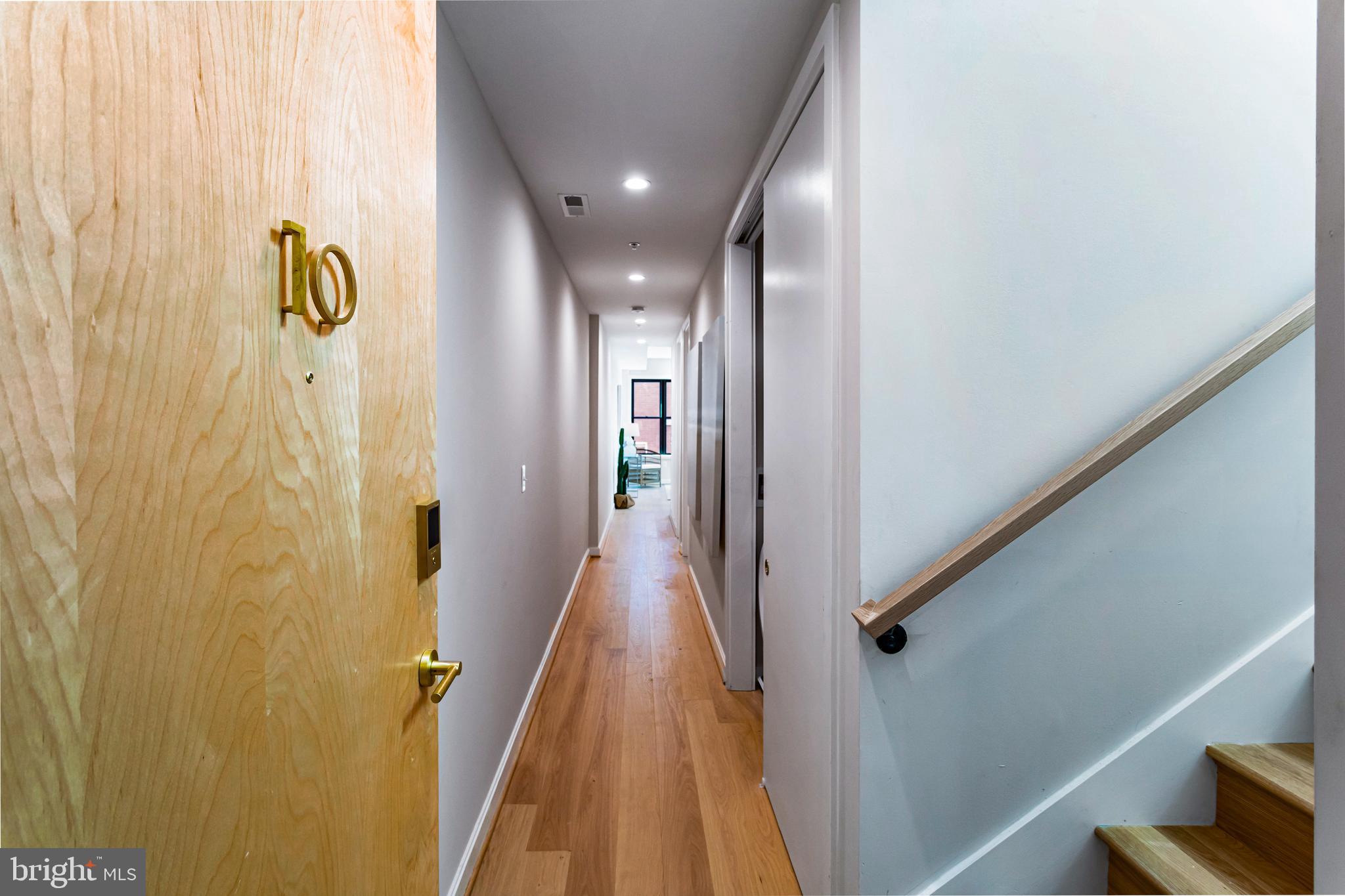 1402 12th Street Northwest, Unit 10 Washington, DC 20005 - Photo 6 of 38 a view of hallway with stairs