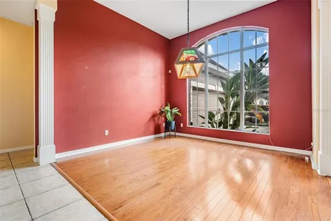 a view of a room with a large window