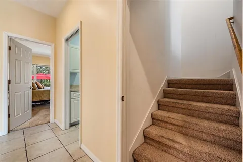 a kitchen with stainless steel appliances granite countertop a stove and a refrigerator
