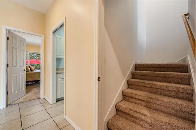 a kitchen with stainless steel appliances granite countertop a stove and a refrigerator