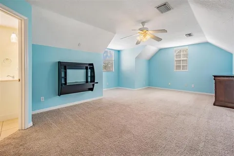 a view of a backyard with sitting area