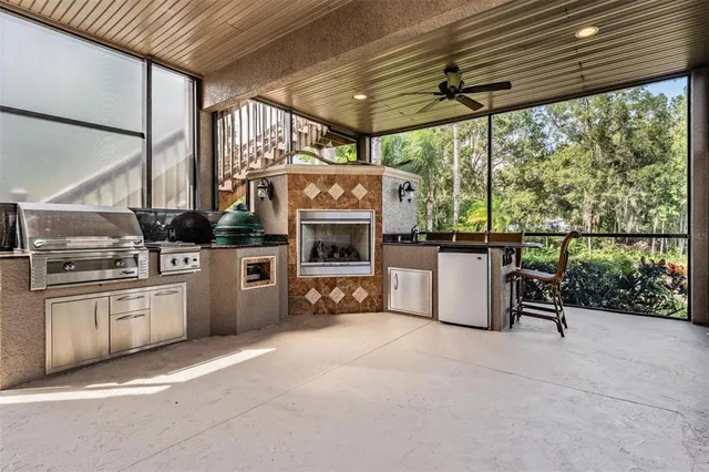 a view of a kitchen with furniture and a stove
