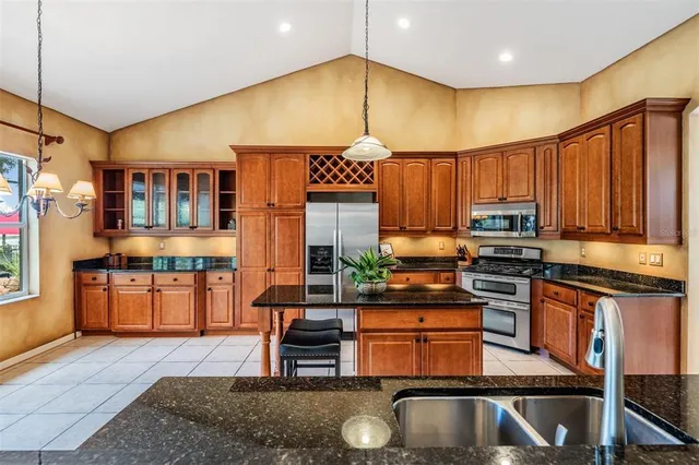 an aerial view of houses with outdoor space