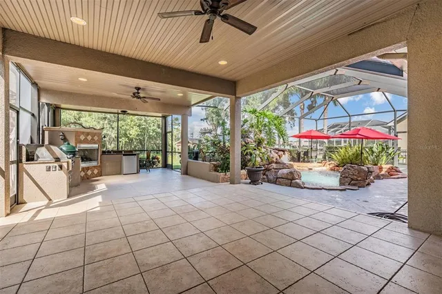 a view of a backyard with sitting area