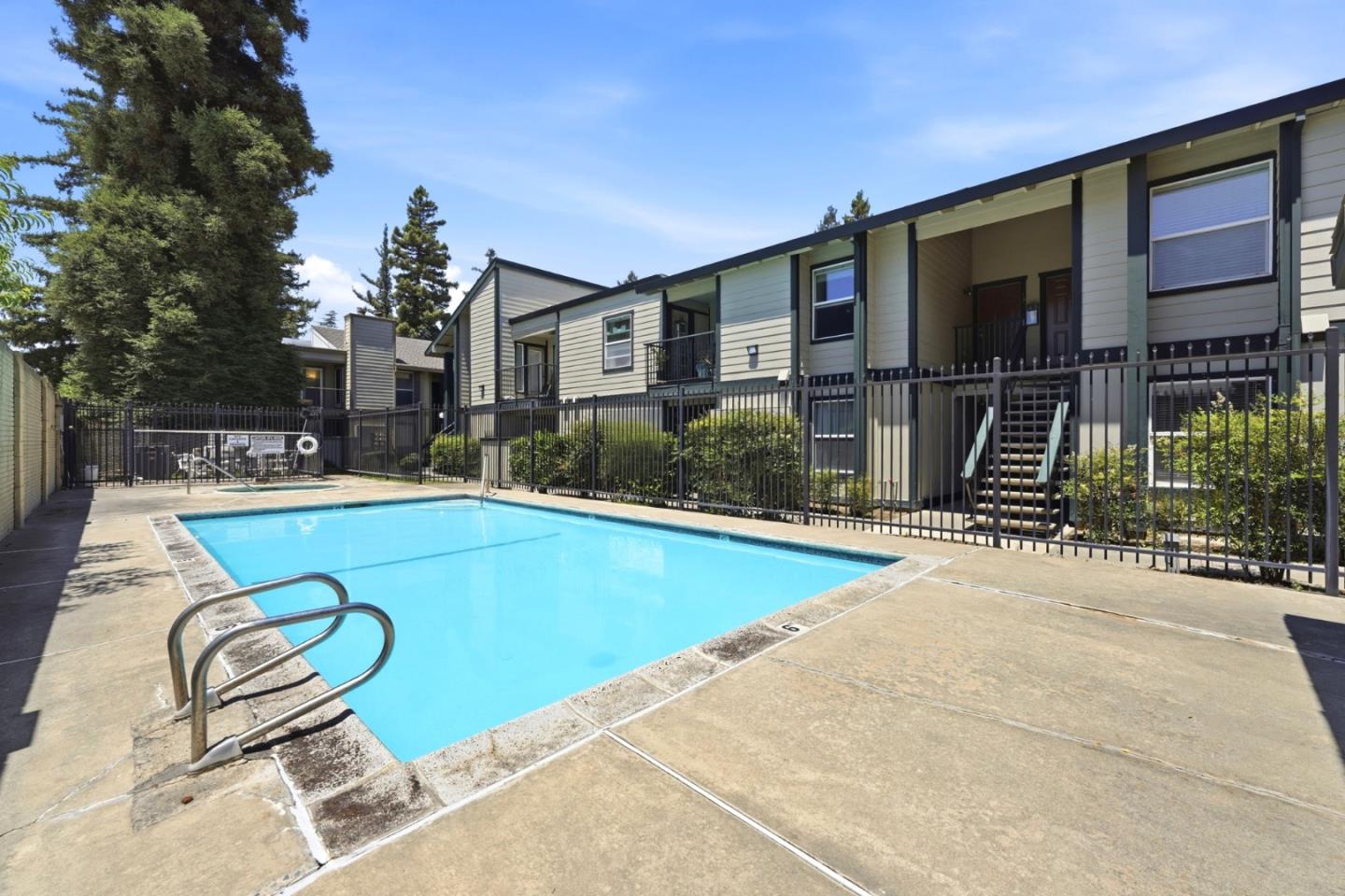 7283 Florin Road, Unit 8 Sacramento, CA 95828 - Photo 32 of 35 a swimming pool with outdoor seating and yard