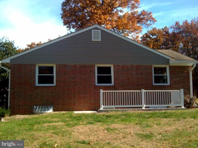 200 East Ridgely Road Lutherville-Timonium, MD 21093 - Photo 10 of 27 Side of house & private entrance to fin. basement