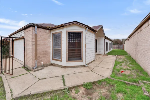 a view of backyard of house