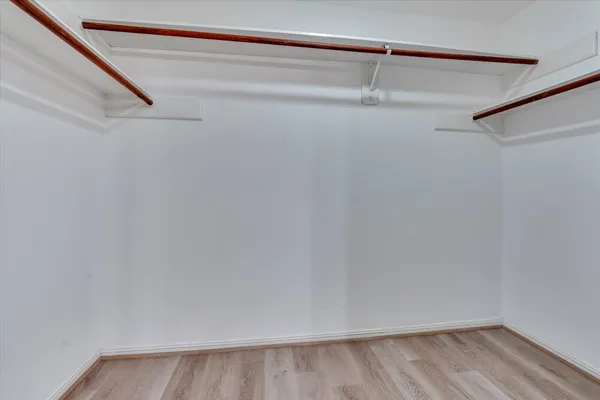 a view of a room with racks on the wall