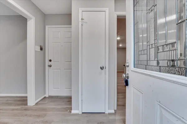 a view of a bathroom with a glass door shower