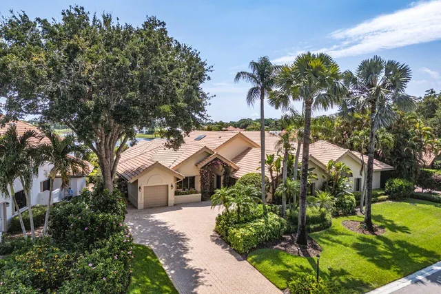 a view of a swimming pool with a table and chairs