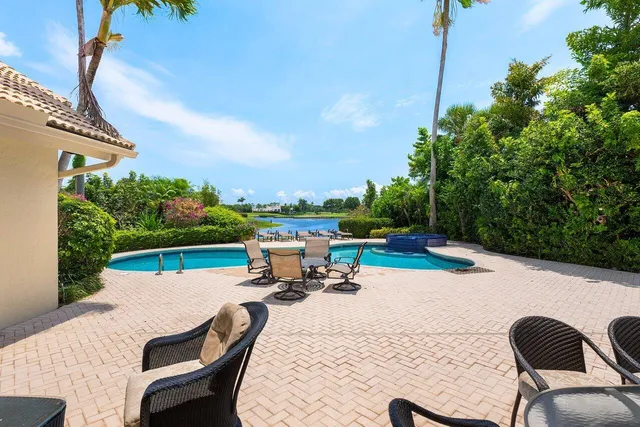a view of hall way with furniture