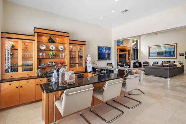 a bedroom with furniture and window