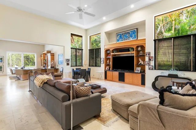 a bathroom with a double vanity sink and mirror with shower