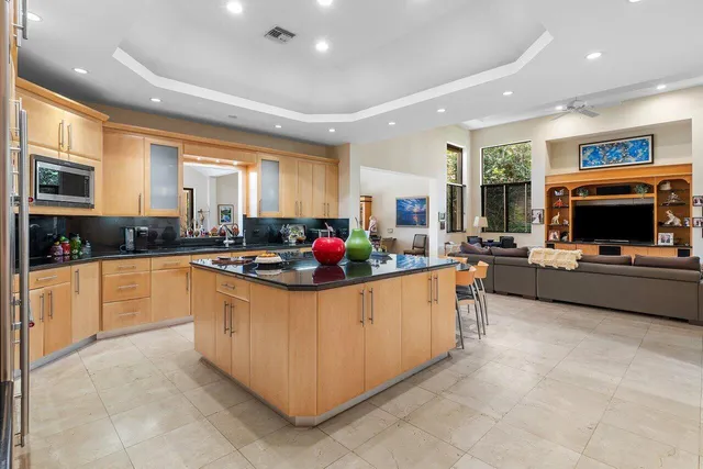 a bedroom with a bed and chair