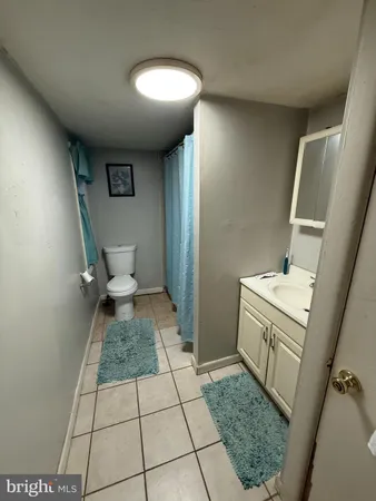 a bathroom with a sink and a toilet
