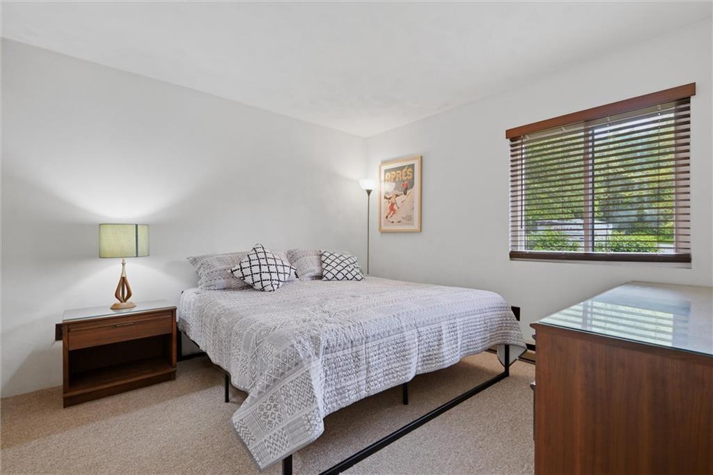 580 Maple Court Hidden Valley, PA 15502 - Photo 14 of 28 a bedroom with a bed and a window