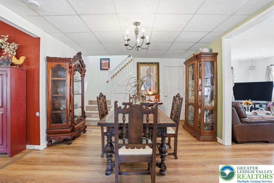4880 Little Gap Road Kunkletown, PA 18058 - Photo 28 of 100 This dining area features elegant wood flooring, creating a seamless flow into adjacent living spaces.