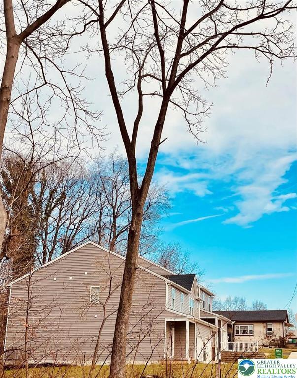 318 Barber Street, Unit LOT 33 Allentown, PA 18103 - Photo 53 of 53 a view of house with yard and trees in the background
