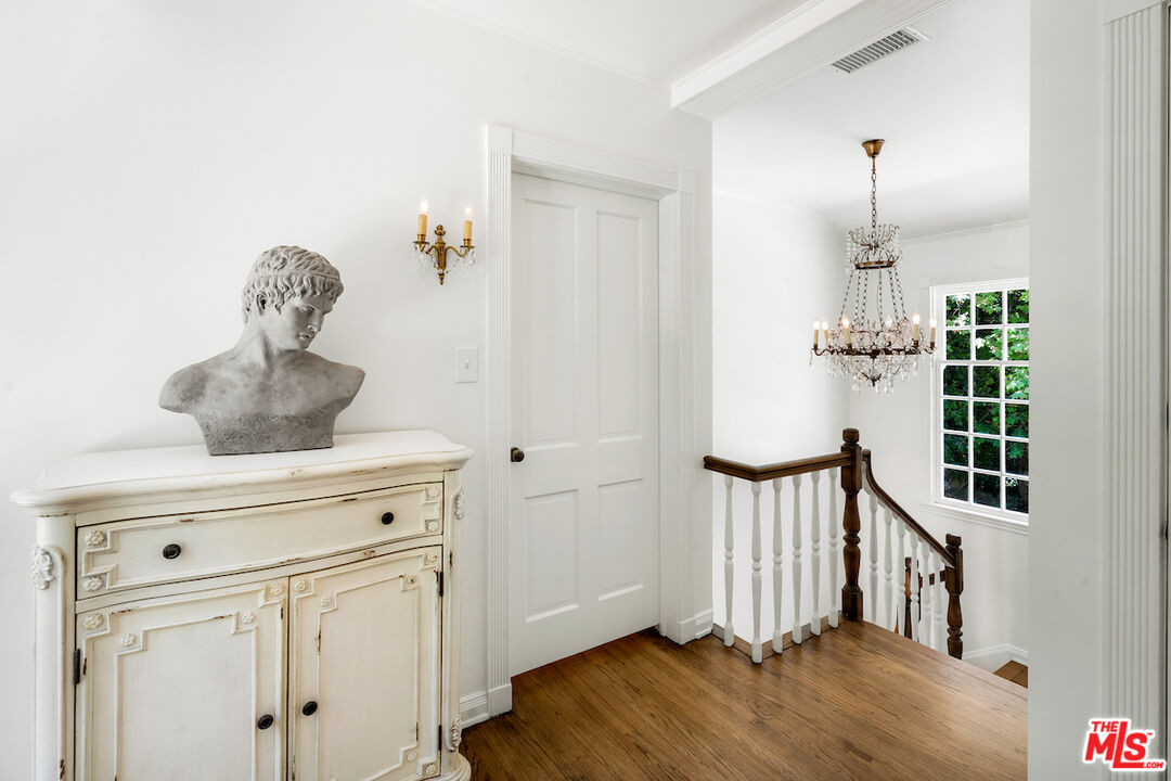 949 Stone Canyon Road Los Angeles, CA 90077 - Photo 20 of 41 a view of entryway with wooden floor