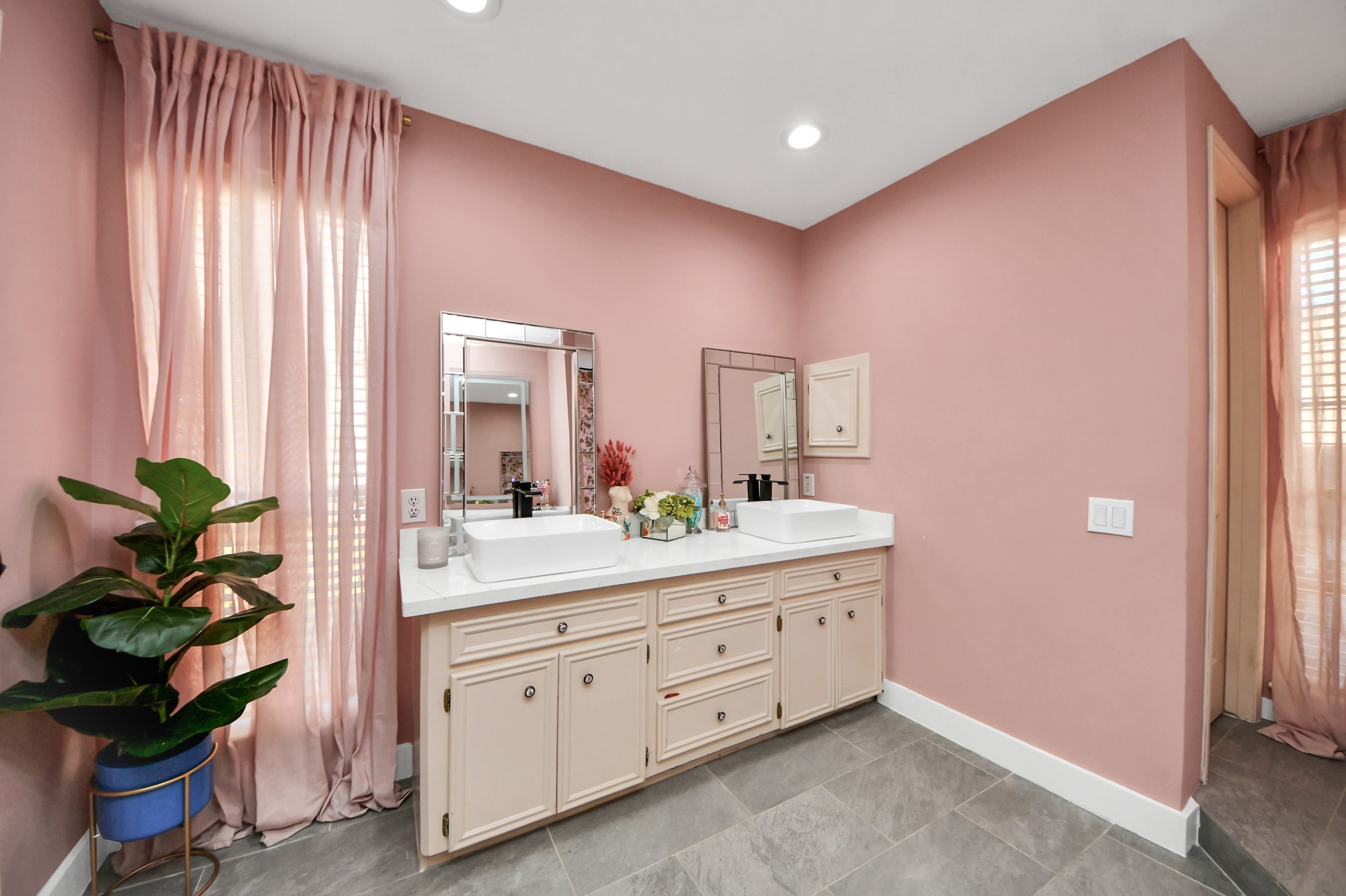 15015 Margeson Street Houston, TX 77084 - Photo 12 of 21 a spacious bathroom with a granite countertop sink a mirror and a shower