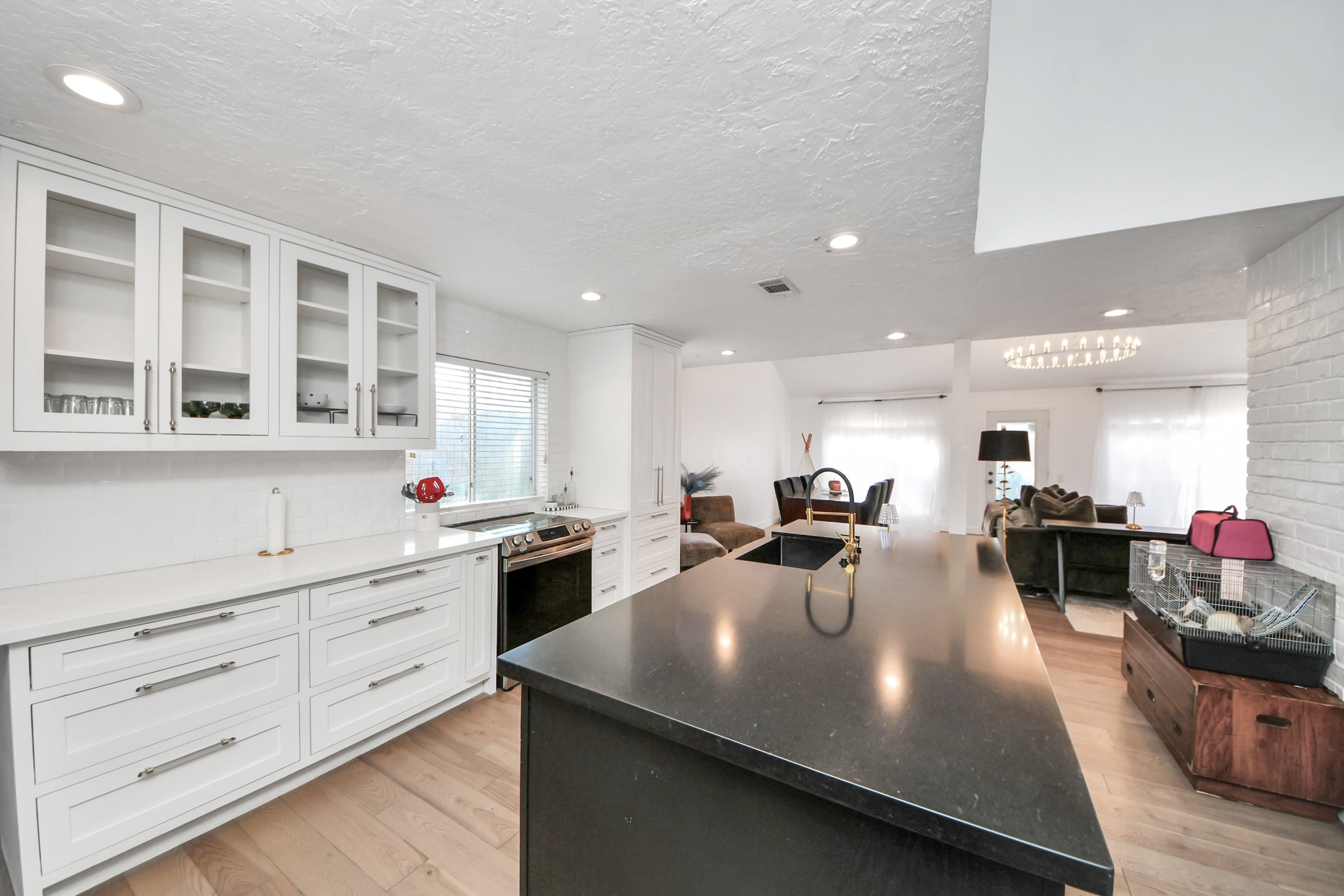15015 Margeson Street Houston, TX 77084 - Photo 6 of 21 a kitchen with counter space cabinets and appliances