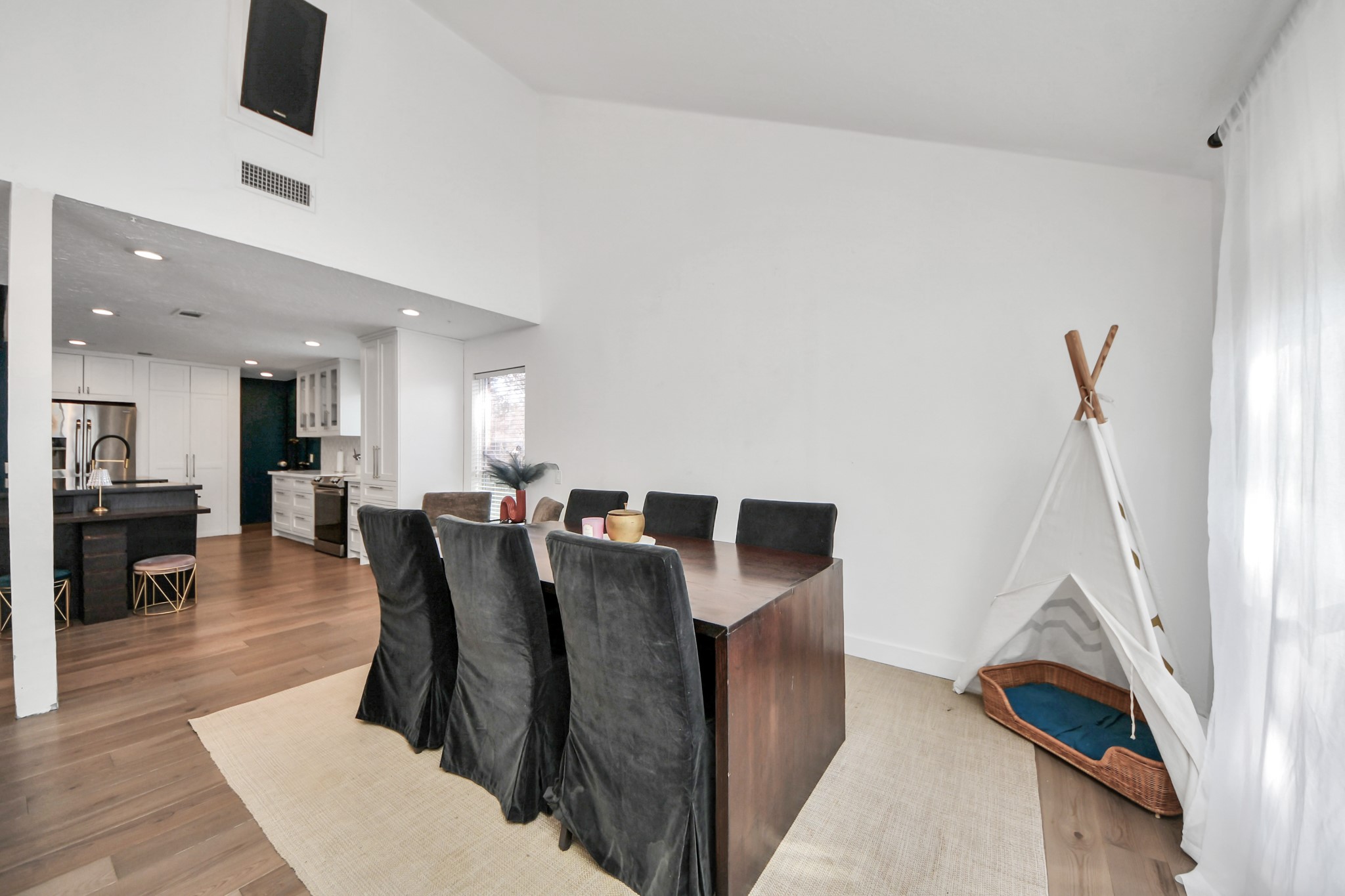 15015 Margeson Street Houston, TX 77084 - Photo 8 of 21 a living room with furniture a wooden floor and a sink