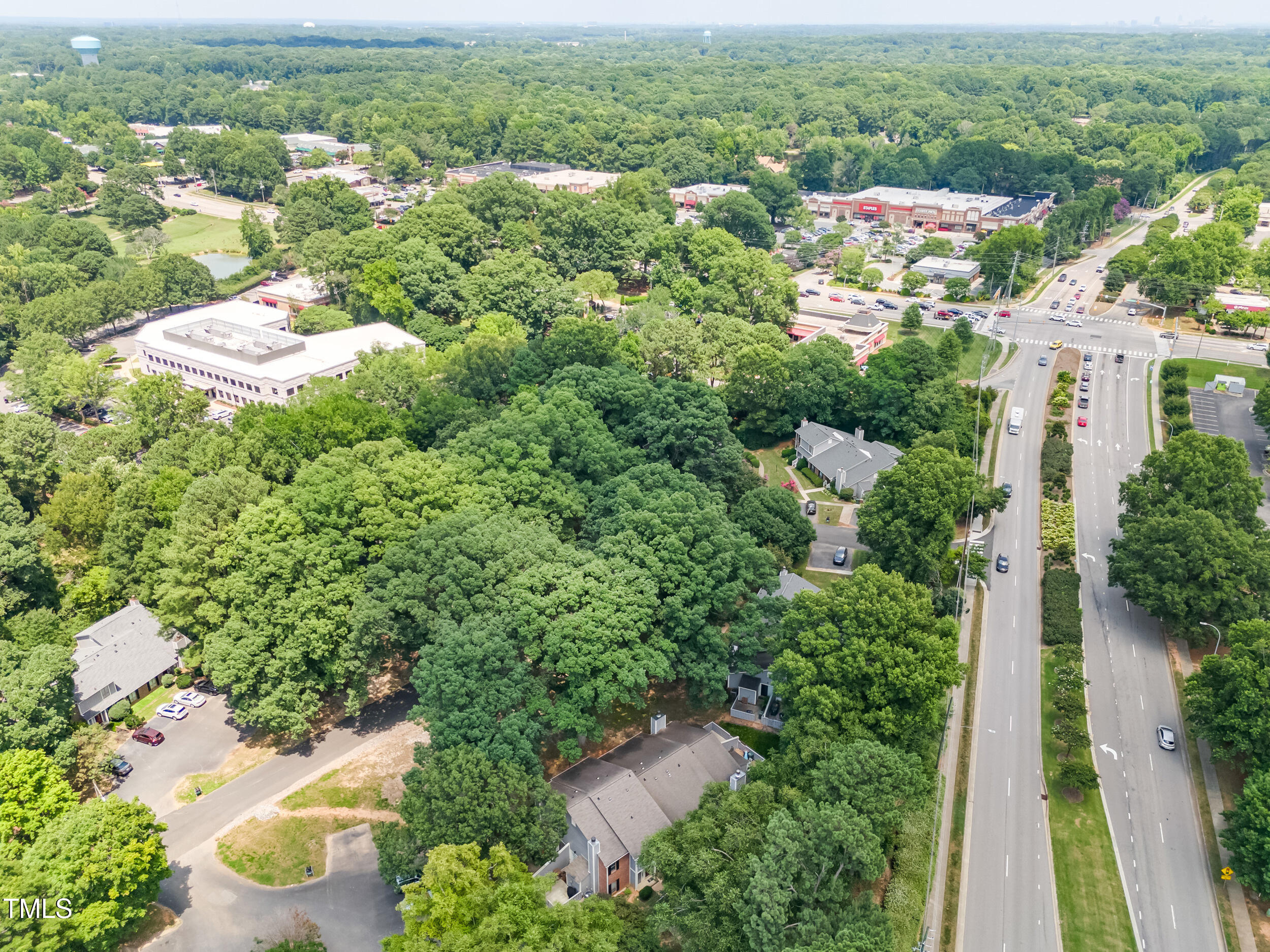 232 Clancy Circle Cary, NC 27511 - Photo 14 of 14 an aerial view of residential houses with outdoor space and trees
