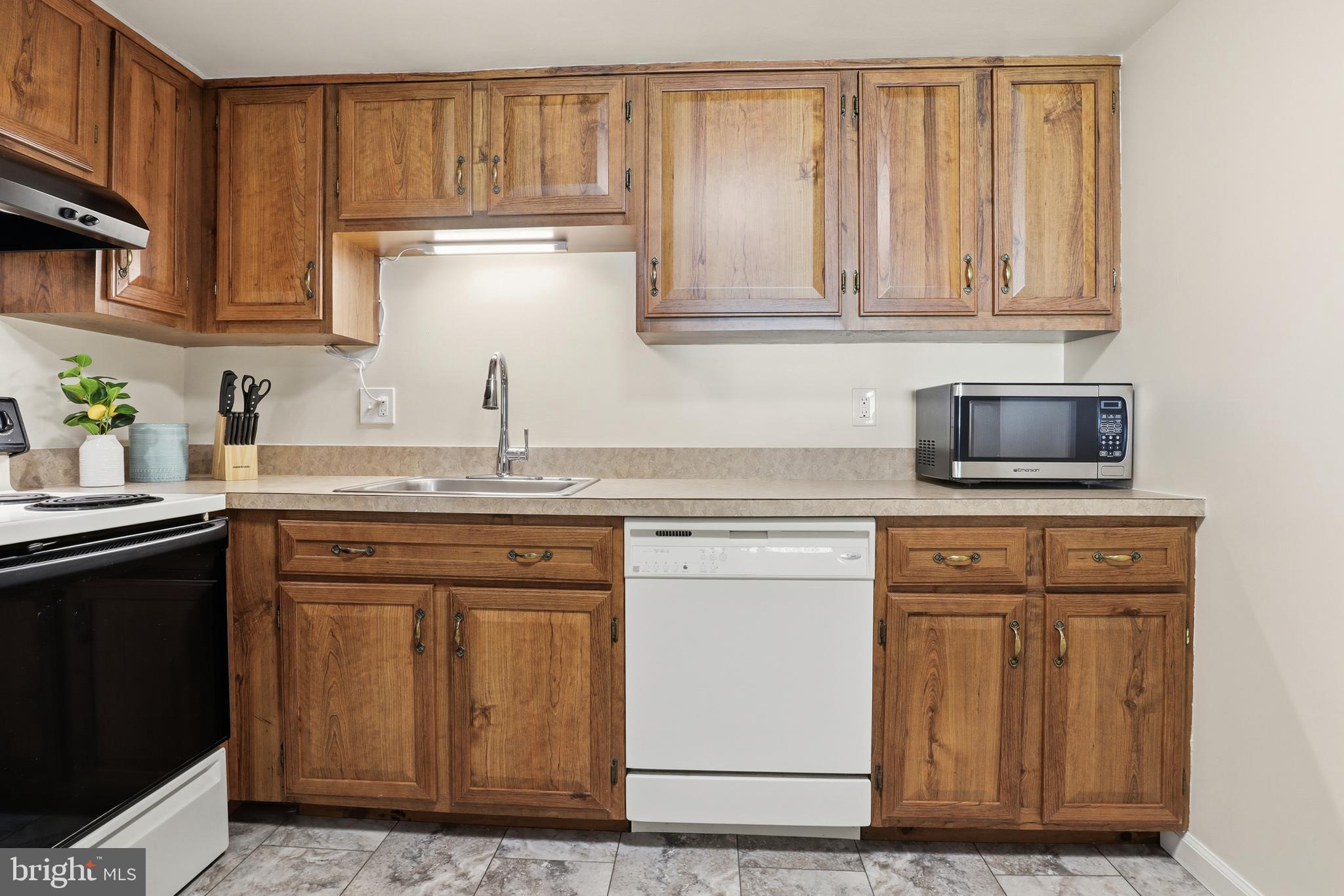 1204 Georgetown Road Middletown, PA 17057 - Photo 13 of 37 a kitchen with granite countertop a sink and cabinets