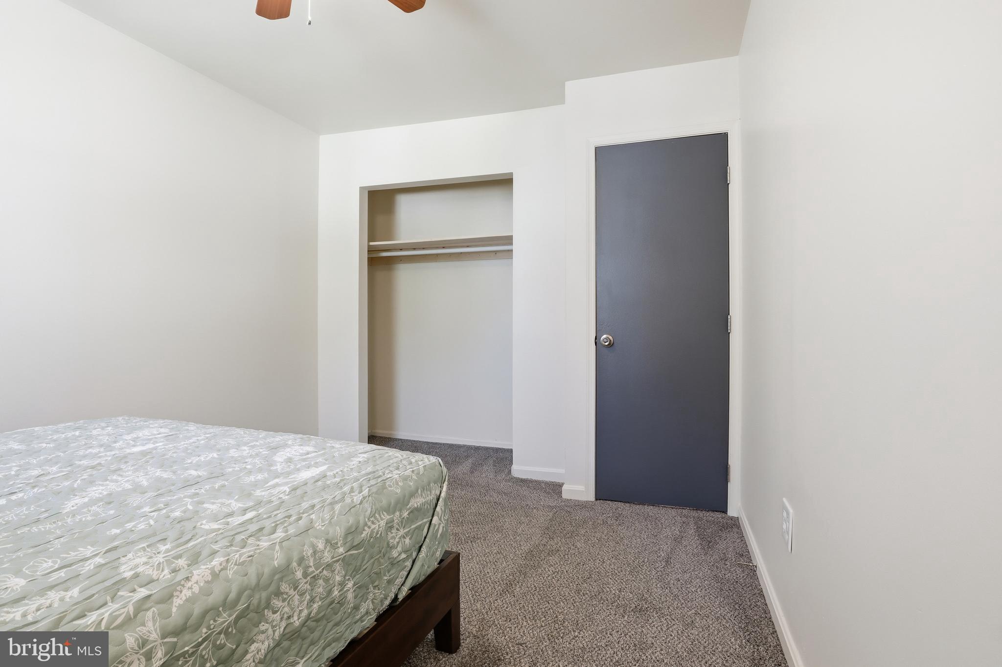 1204 Georgetown Road Middletown, PA 17057 - Photo 19 of 37 a bedroom with a bed and a mirror