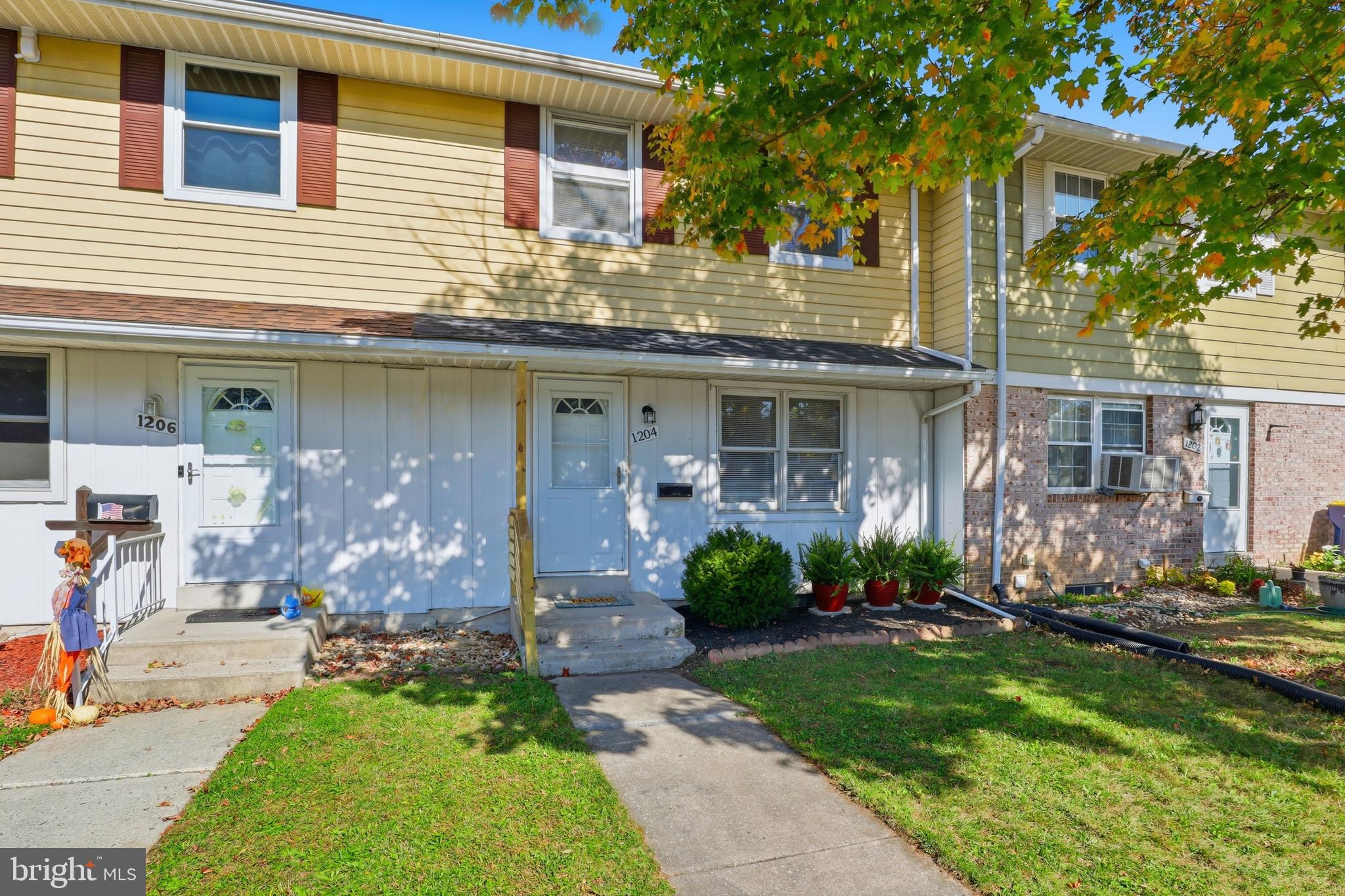 1204 Georgetown Road Middletown, PA 17057 - Photo 2 of 37 a front view of a house with a yard