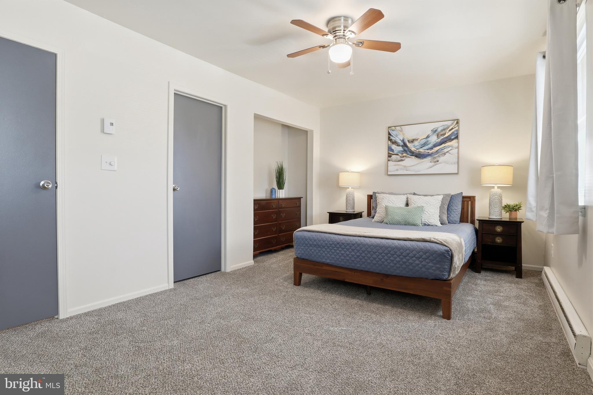1204 Georgetown Road Middletown, PA 17057 - Photo 23 of 37 a bedroom with a bed and a chandelier