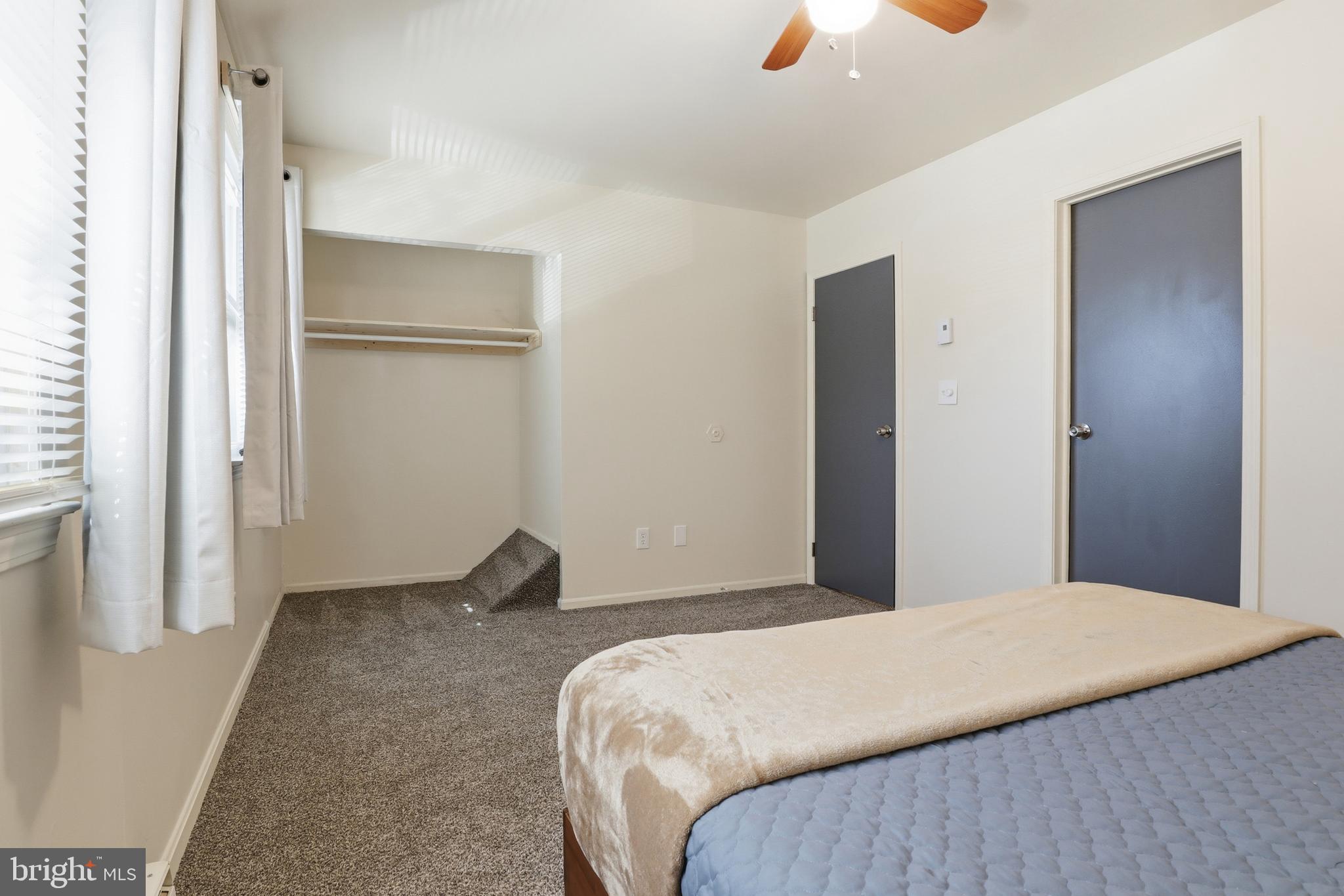1204 Georgetown Road Middletown, PA 17057 - Photo 24 of 37 a bedroom with a bed and a painting on the wall