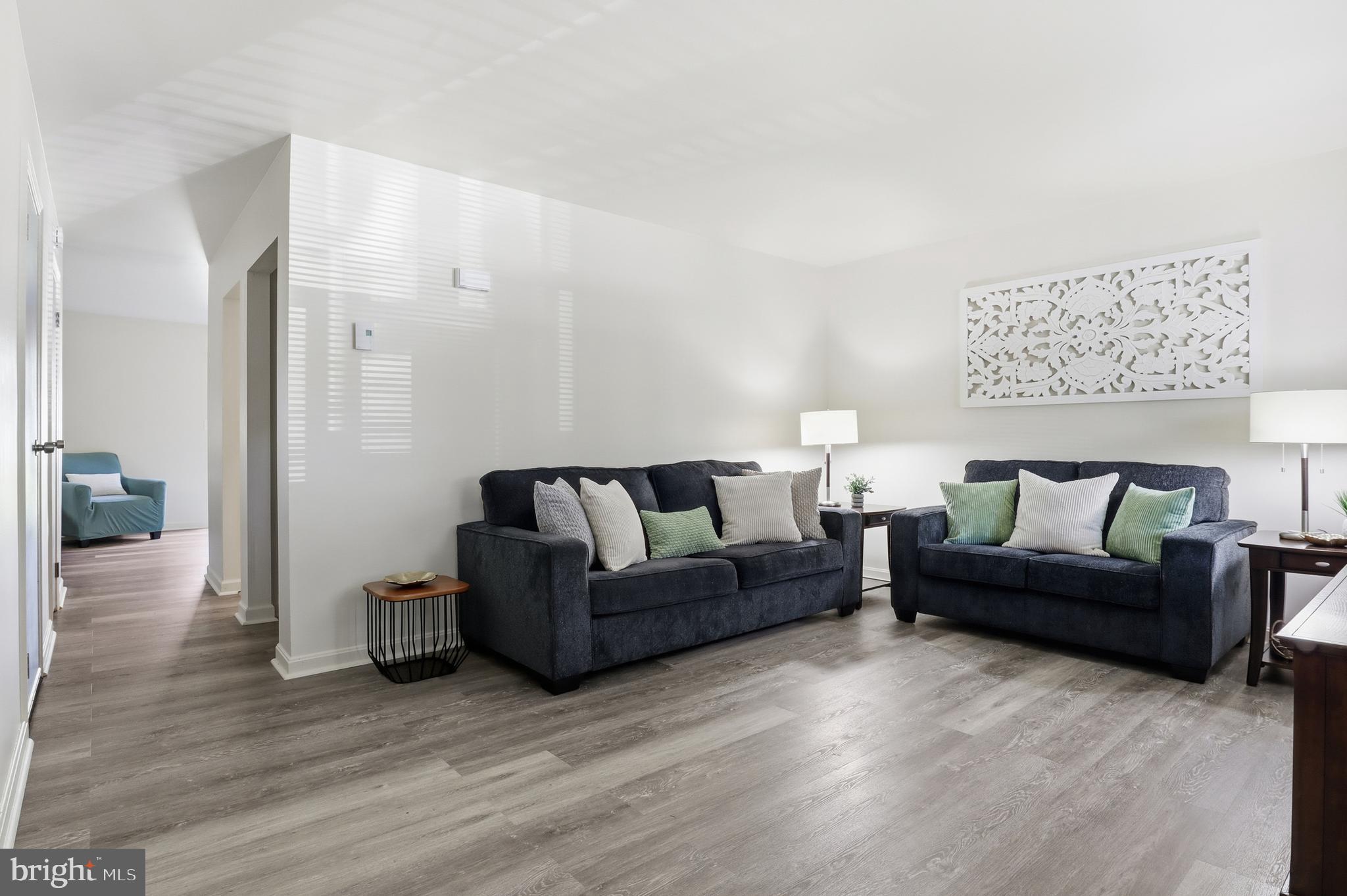 1204 Georgetown Road Middletown, PA 17057 - Photo 4 of 37 a living room with furniture and a wooden floor