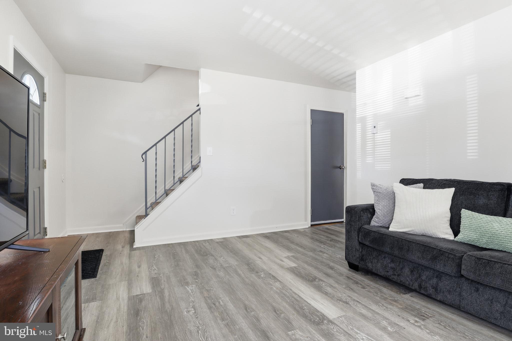 1204 Georgetown Road Middletown, PA 17057 - Photo 5 of 37 a living room with furniture and a wooden floor