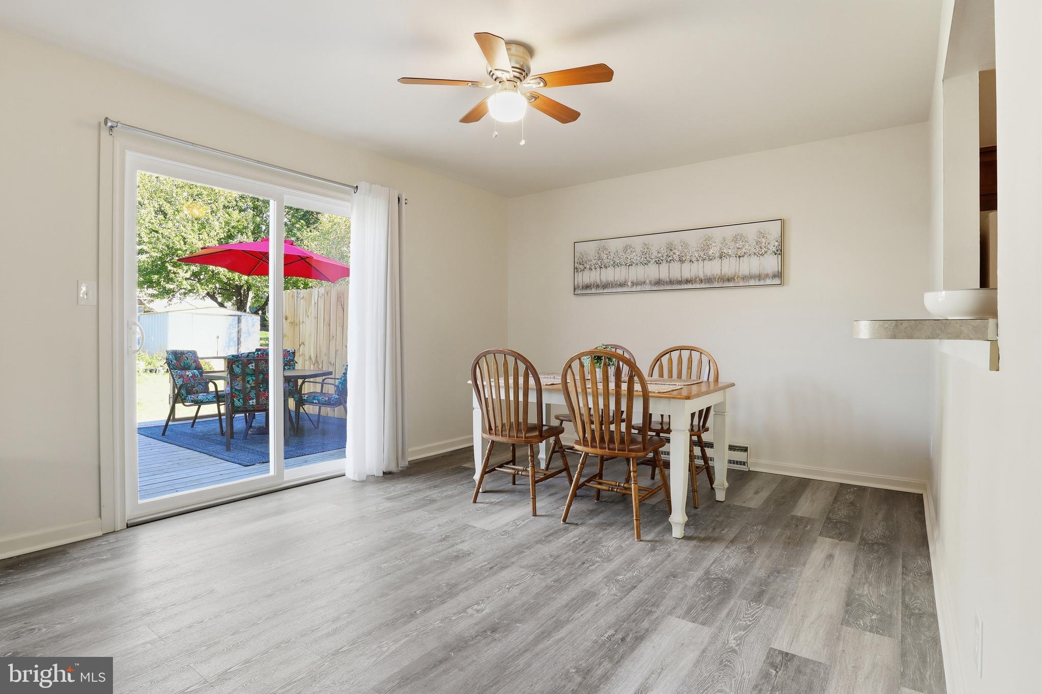 1204 Georgetown Road Middletown, PA 17057 - Photo 7 of 37 a view of a dining room with furniture and wooden floor