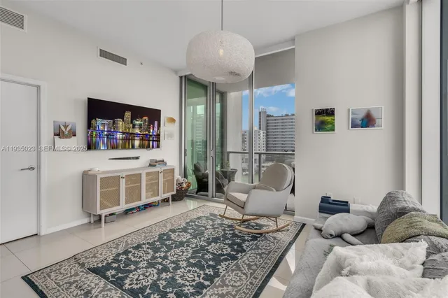 a kitchen with a dining table and chairs