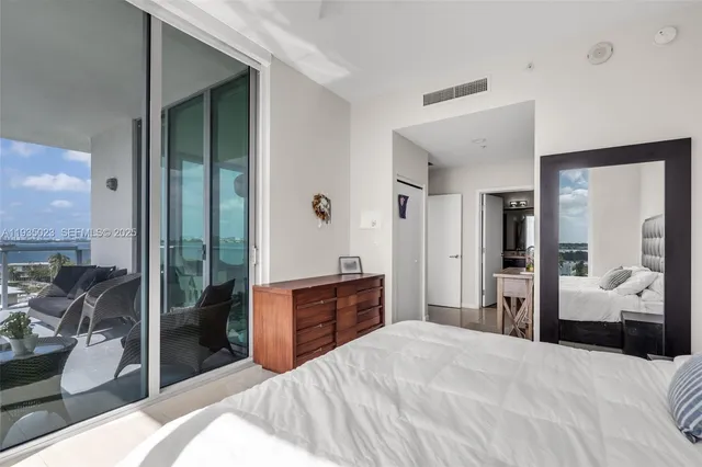 a bathroom with a bathtub and a sink