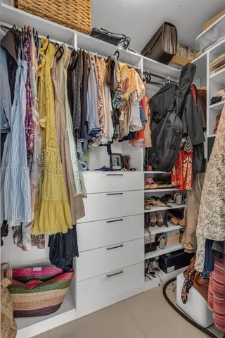 a bathroom with a mirror and a shower