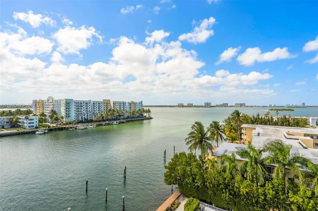 a view of a lake with a city