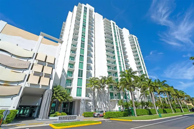 a view of a hallway with a flat screen tv