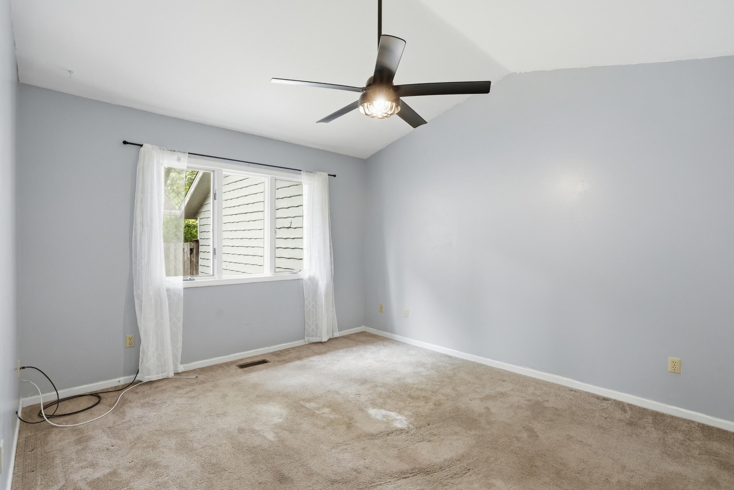225 Clinton Street Lowell, IN 46356 - Photo 15 of 22 a view of an empty room with a window