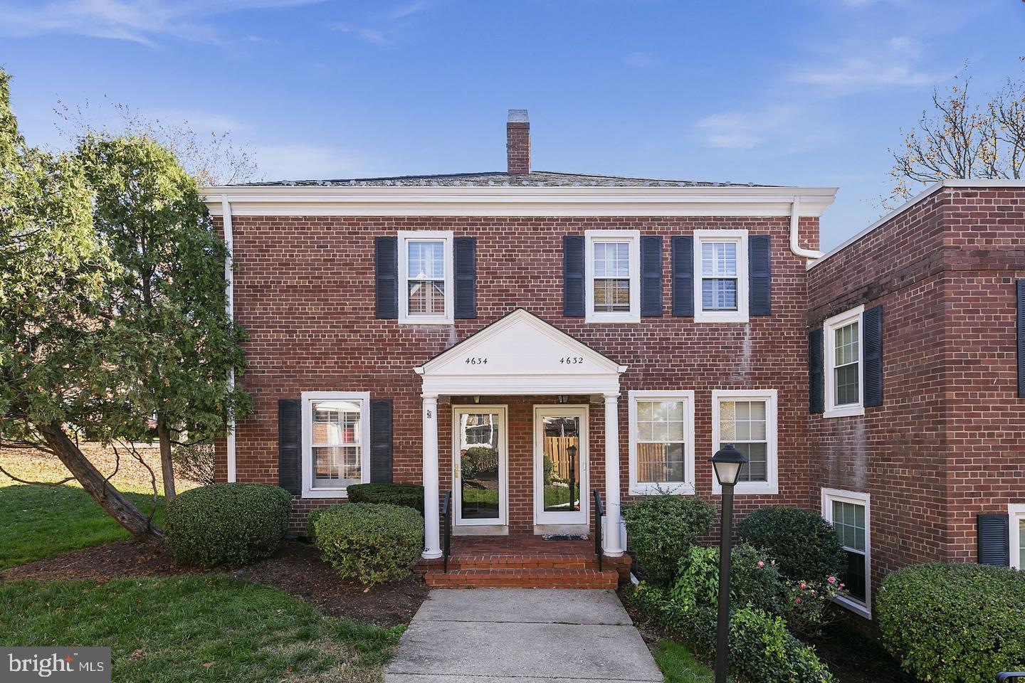 4634 31st Road South Arlington, VA 22206 - Photo 2 of 36 a front view of a house with garden