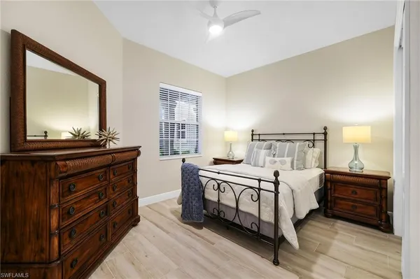 a living room with lots of furniture and a flat screen tv