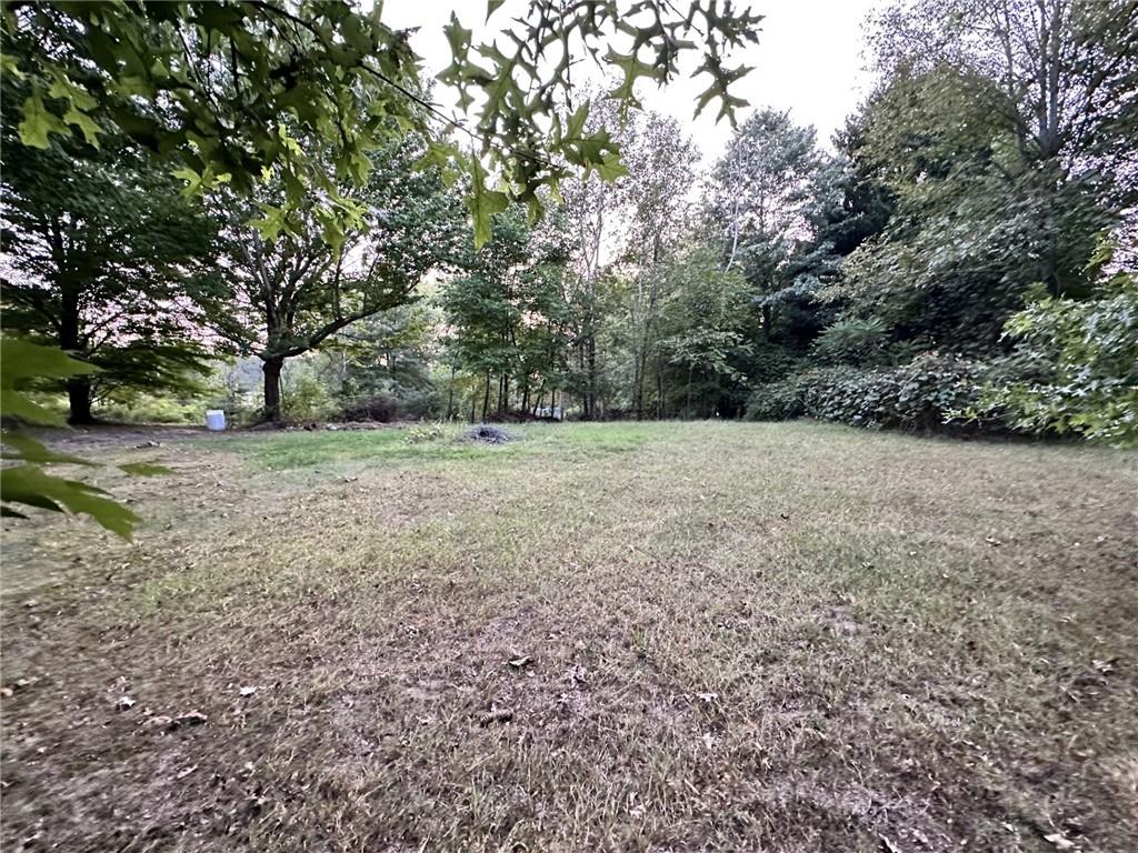3481 Old State Road New Castle, PA 16101 - Photo 6 of 10 a view of a field with trees in the background