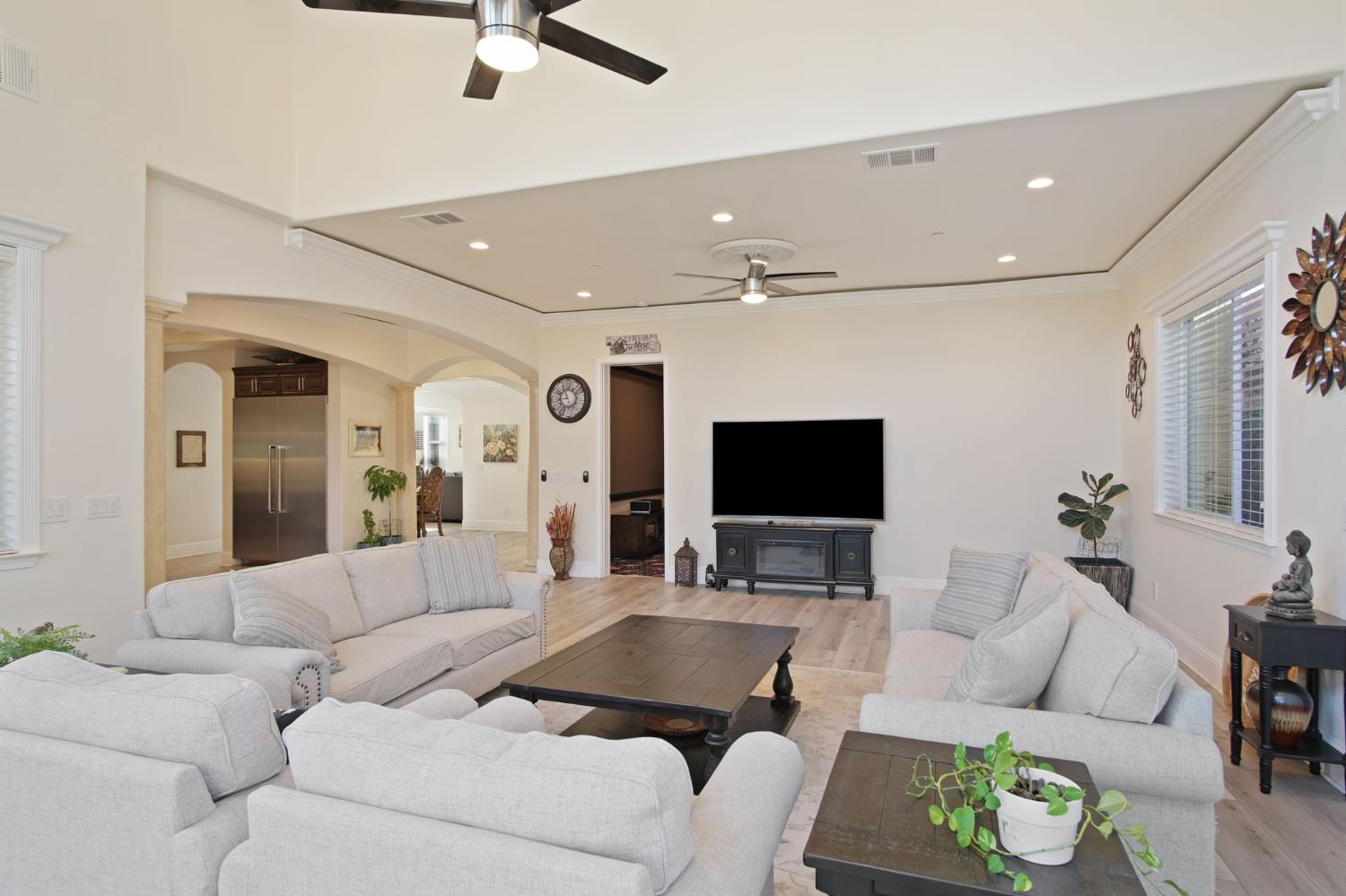 3205 Hillglen Avenue Modesto, CA 95355 - Photo 18 of 45 a living room with furniture and a flat screen tv