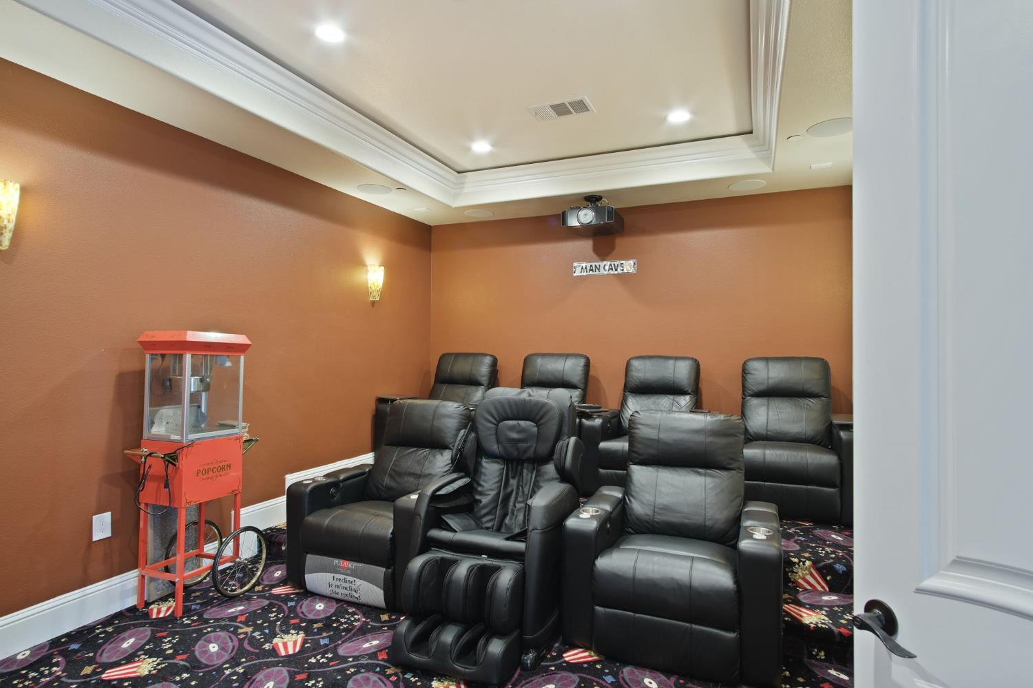 3205 Hillglen Avenue Modesto, CA 95355 - Photo 21 of 45 a media room with lots of chairs and wooden floor