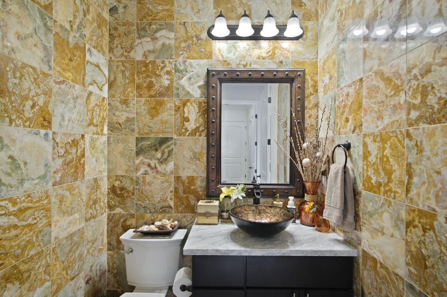 3205 Hillglen Avenue Modesto, CA 95355 - Photo 23 of 45 a bathroom with a sink and a mirror